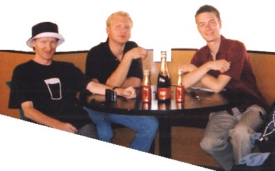 The tricky trio sat around a table admiring a sample of the treasure